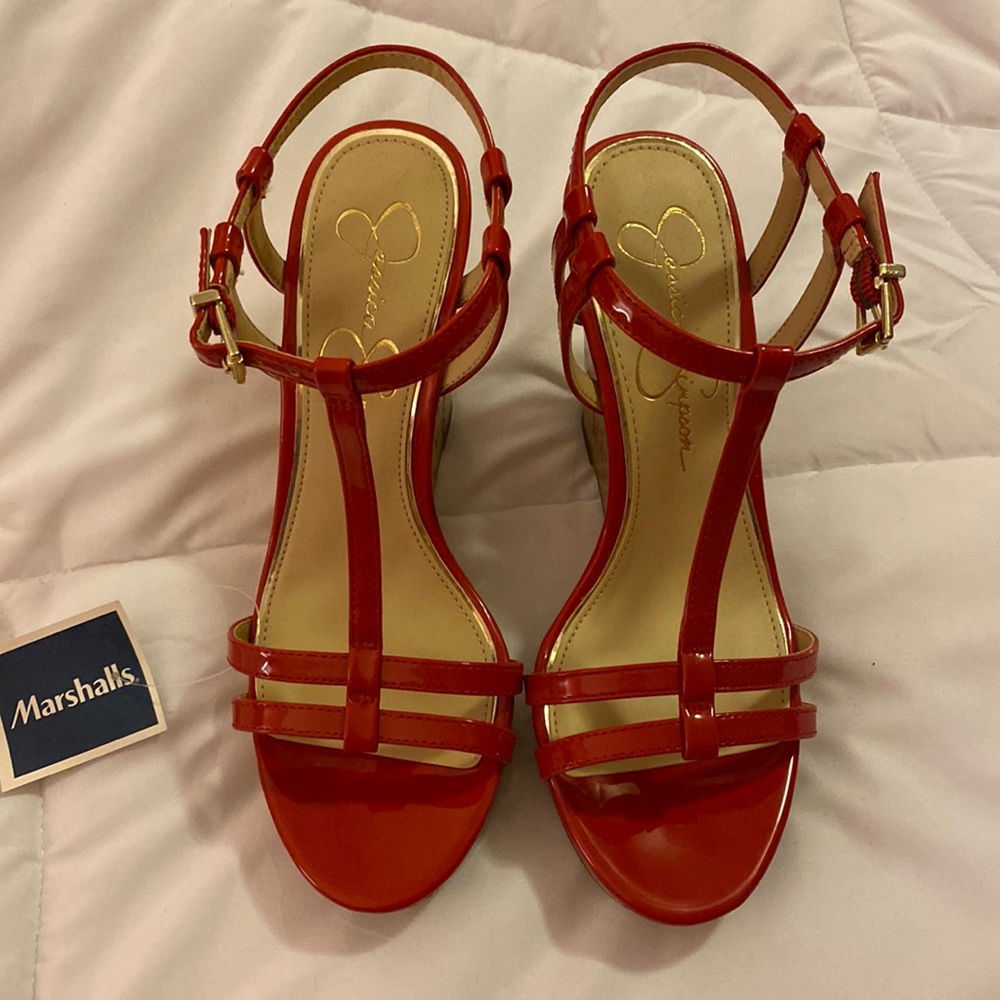 Woman’s red wedge shoes new never worn.